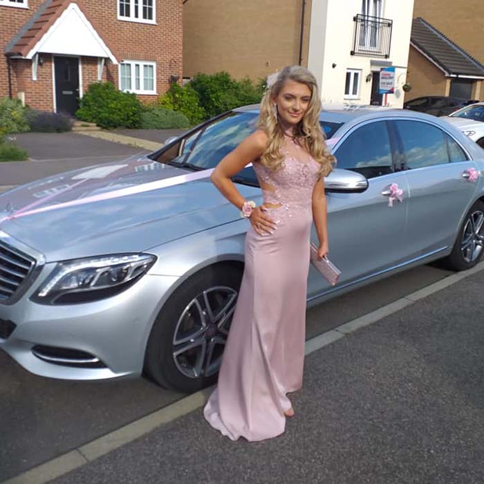 Young girl in pink dress ready for prom